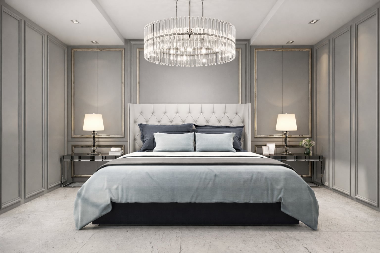 Bridal suite bedroom at OZEA with chandelier lighting and a calm editorial interior.